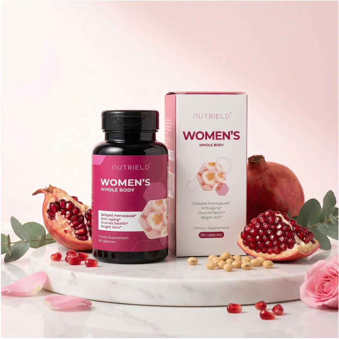 Women's whole body supplement bottle and box with pomegranate, soybeans, and rose petals